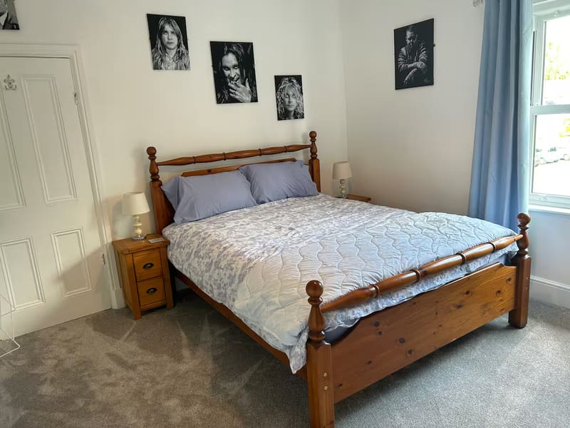Bedroom 1 with a king bed and wardrobe